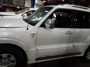 Left Front Door Window - Mitsubishi Pajero 2004