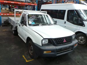 Left Front Window Regulator Motor - Mitsubishi Triton 2003